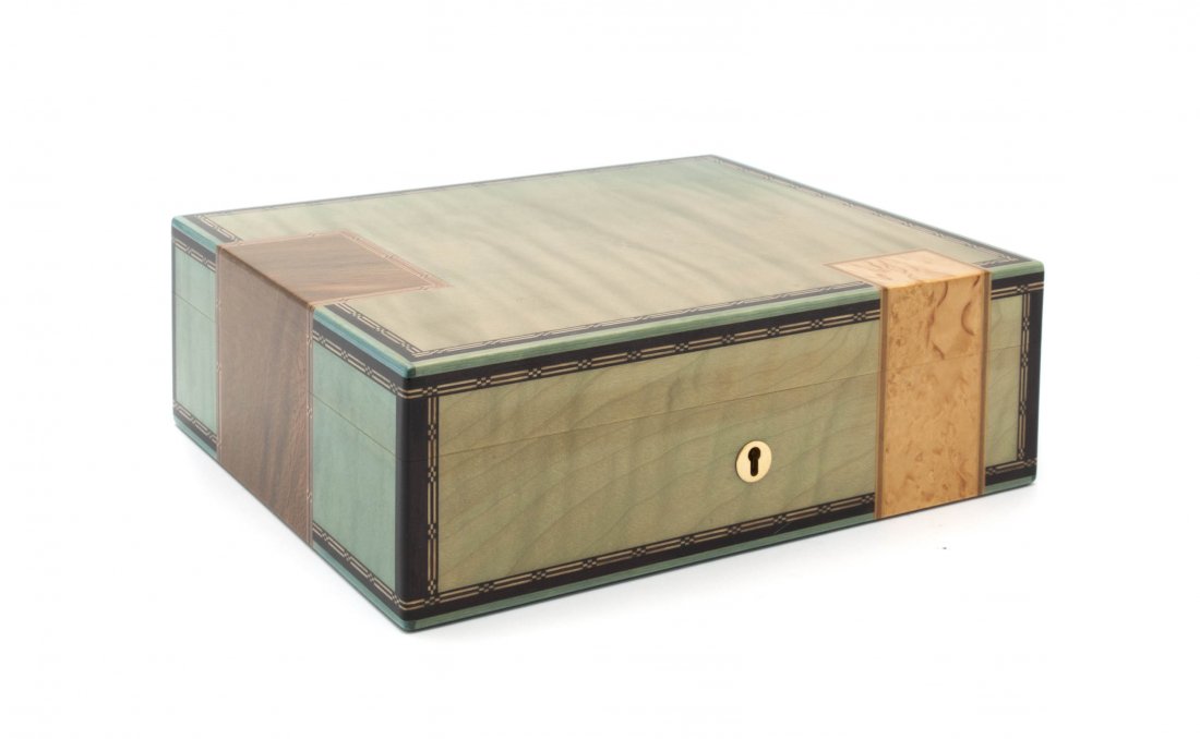 An Elie Bleu Inlaid Wood Jewelry Box, Height 3 1/4 x wi: An Elie Bleu Inlaid Wood Jewelry Box, of rectangular form, having a hinged top opening to a fitted interior. Height 3 1/4 x width 9 7/8 x depth 8 1/4 inches.