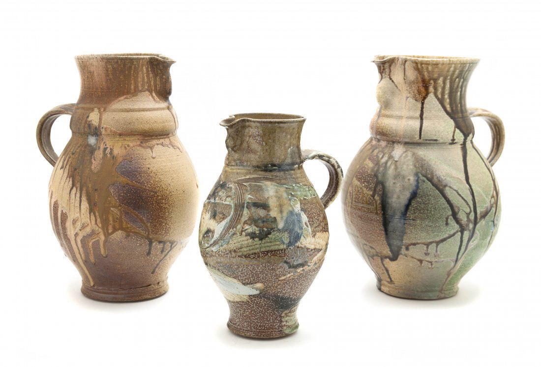 Three Studio Ceramic Articles, Don Reitz, Height of tal: Three Studio Ceramic Articles, Don Reitz, comprising three baluster form pitchers, each having a single handle, of graduated sizes. Height of tallest 14 1/2 inches.