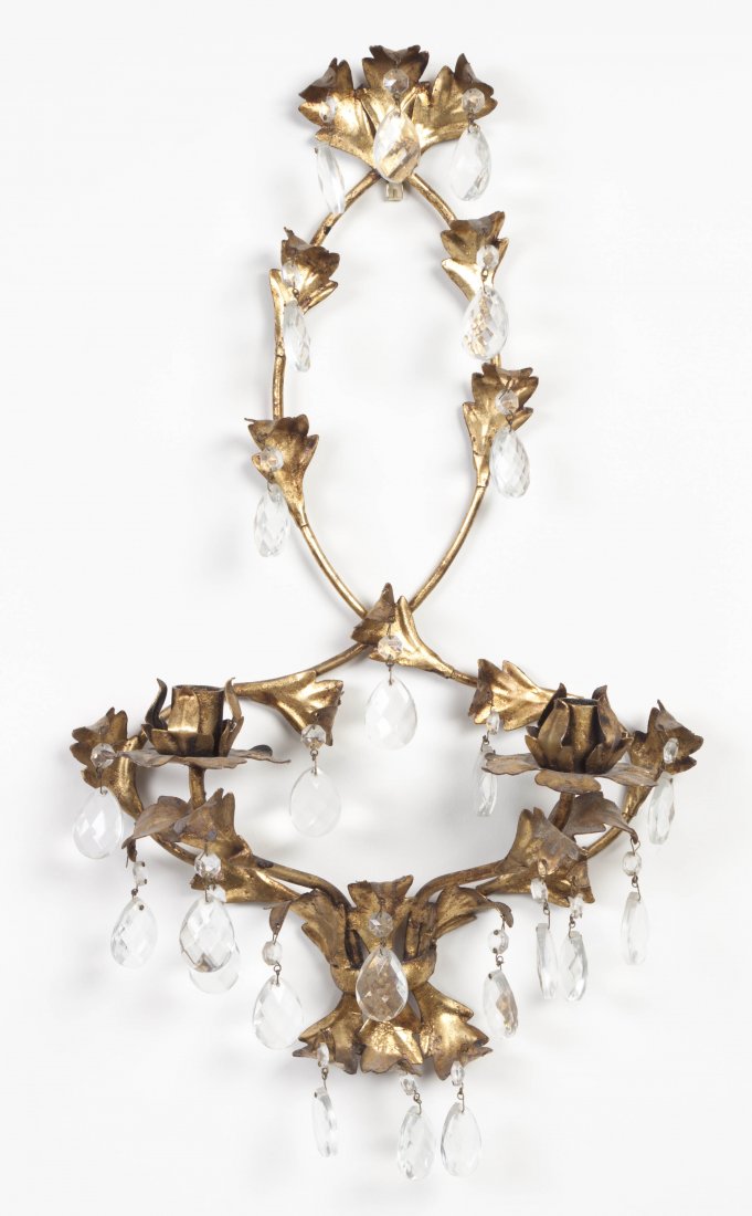 A Parcel Gilt Two Light Sconce, Length 19 1/2 inches.: A Parcel Gilt Two Light Sconce, of leaf and vine form, with hanging teardrop glass prisms. Length 19 1/2 inches. Property from the Collection of Marshall and Natalie Feld, Milwaukee, Wisconsin