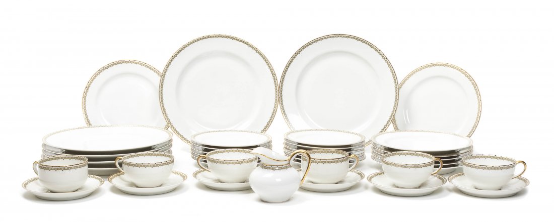 A Limoges Porcelain Partial Dinner Service, Diameter of: A Limoges Porcelain Partial Dinner Service, comprising 12 dinner plates, 12 luncheon plates, 12 dessert plates, 16 saucers, 1 creamer, 9 teacups and 5 coffee cups; 67 items total. Diameter of dinner p