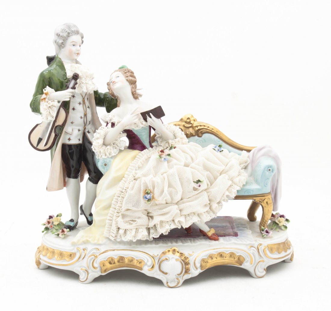 A Dresden Figural Group, Height 9 3/4 inches.: A Dresden Figural Group, depicting a seated woman reading, gazing up at a standing man with a violin. Height 9 3/4 inches. Property from the Estate of August and Marguerite Barkow, Wauwatosa, Wisconsi