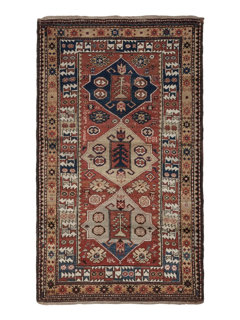 A Kazak Rug: A Kazak Rug South Caucasus, Late 19th Century 7 feet 4 inches x 4 feet 3 inches. Property from a Private Family Trust This lot is located in Cincinnati.