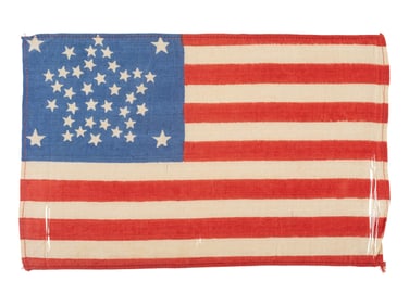 [FLAGS]. 38-star American parade flag with "Great Star" configuration. Ca 1876-1889.