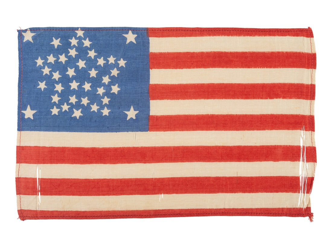 [FLAGS]. 38-star American parade flag with "Great Star" configuration. Ca 1876-1889. (1 of 2)