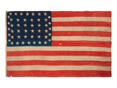 [FLAGS]. 38-star American flag converted to a 48-star flag. Ca 1876-1950s.