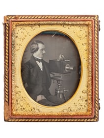 [EARLY PHOTOGRAPHY]. Sixth plate daguerreotype of a photographer posed with an American-made