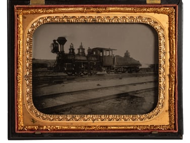 [EARLY PHOTOGRAPHY]. Quarter plate tintype of a Northern Pacific steam locomotive.