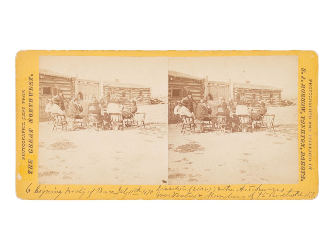 MORROW, Stanley J. (1843-1921), photographer. "Signing Treaty of Peace July 11th 1870, Sisseton: MORROW, Stanley J. (1843-1921), photographer. "Signing Treaty of Peace July 11th 1870, Sisseton (Sioux) & the Arikarees, Gros Ventres, and Mandans, of Ft Berthold, D.T." Stereoview on yellow mount