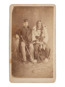 CROSS, W.R. (1839-1907), photographer. CDV of Brule Lakota Sioux Chief Hollow Horn Bear with an