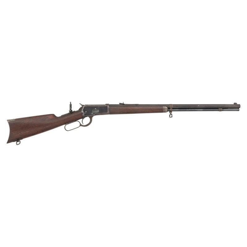 **Winchester Model 1892 .32-20: **Winchester Model 1892 .32-20 .32-20. 24" barrel length. SN: 219650. Blued metal finish with walnut straight wrist stock featuring crescent butt and half length handguard. Lever action repeating rifl