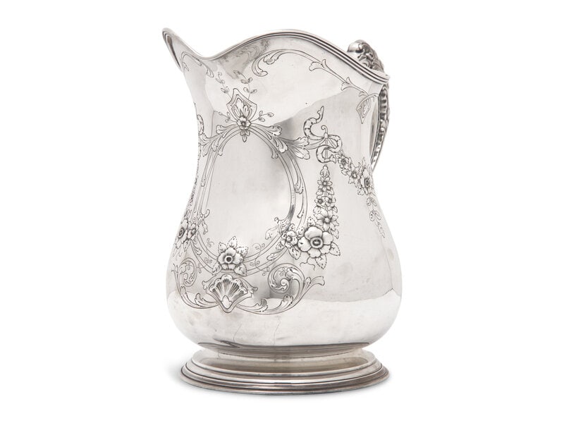 An American Sterling Silver Repousse Water Pitcher (1 of 3)