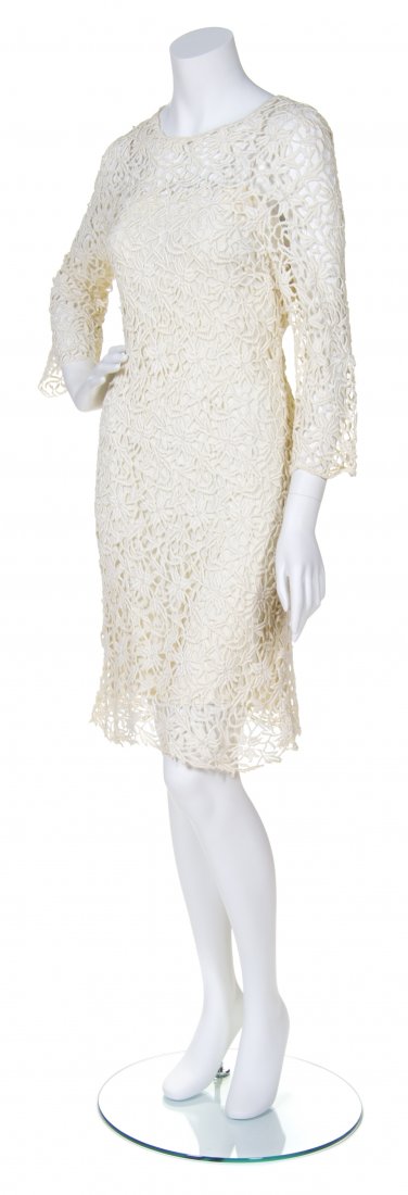 A Mollie Parnis Ivory Crochet Dress,: A Mollie Parnis Ivory Crochet Dress, with ivory silk slip. Labeled: Mollie Parnis New York / Saks Fifth Avenue.