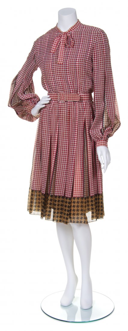A Malcolm Starr Red and Beige Houndstooth Dress,: A Malcolm Starr Red and Beige Houndstooth Dress, with contrasting brown and black houndstooth trim and matching belt. Labeled: Elinor Simmons for Malcolm Starr / Made in the British Colony of Hong Kon