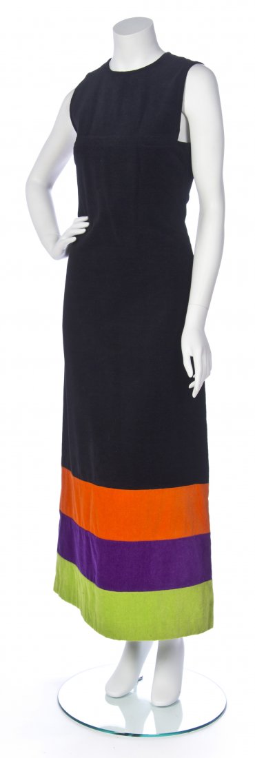 A Pierre Cardin Black Terrycloth Long Dress, Size 38.: A Pierre Cardin Black Terrycloth Long Dress, with orange, lime green and purple stripes around the bottom. Labeled: Pierre Cardin Creation Paris. Size 38. Property from the Collection of The Vintage C