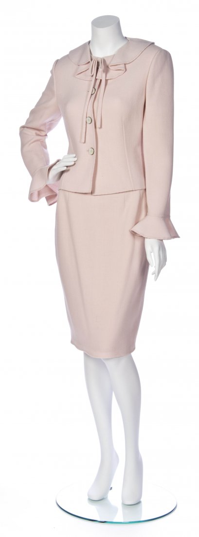 A Bill Blass Pink Wool Crepe Skirt Suit,: A Bill Blass Pink Wool Crepe Skirt Suit, with ruffled collar and cuffs. Labeled: Bill Blass. Property from the Estate of Alyne Queener Massey, Nashville, Tennessee