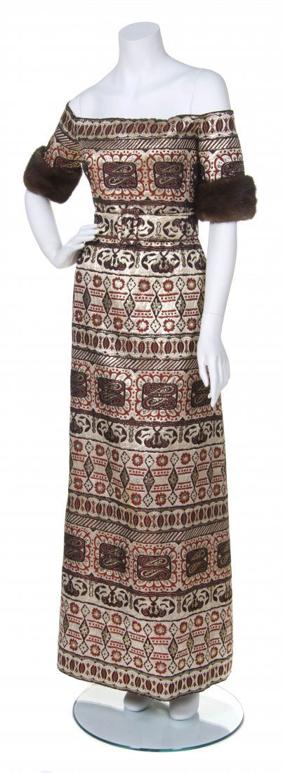 An Oscar de la Renta Multicolor Metallic Brocade Evenin: An Oscar de la Renta Multicolor Metallic Brocade Evening Gown, brown mink sleeves, with matching belt. Labeled: Oscar de la Renta Boutique. Property from the Estate of Florence Delzell