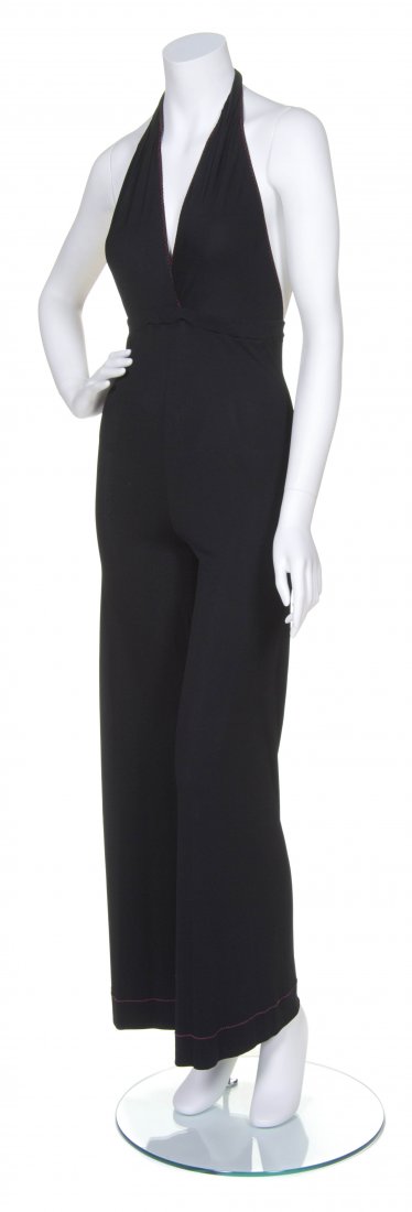 A Stephen Burrows Black Jersey Halter Jumpsuit,: A Stephen Burrows Black Jersey Halter Jumpsuit, red contrasting stitching along neckline. Labeled: Stephen Burrows.