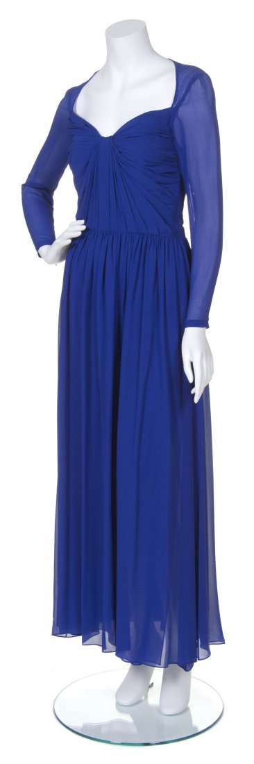 A Givenchy Royal Blue Chiffon Evening Dress, Size 38.: A Givenchy Royal Blue Chiffon Evening Dress, sheer long sleeves, V neckline with gathered bodice. Labeled: Givenchy Couture. Size 38.