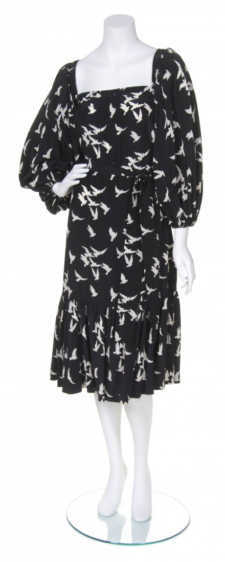 An Yves Saint Laurent Black and White Bird Print Dress,: An Yves Saint Laurent Black and White Bird Print Dress, with self belt. Labeled: Saint Laurent. Size 38. Property from a New York City Collection
