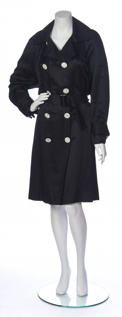 An Ilie Wacs Black Silk Evening Trench Coat,: An Ilie Wacs Black Silk Evening Trench Coat, 1980s, with rhinestone buttons. Labeled: Ilie Wacs. Property from the Estate of Alyne Queener Massey, Nashville, Tennessee