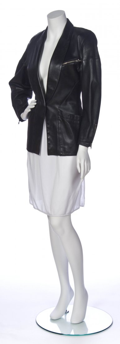 An Alaia Black Leather Jacket, Size 38.: An Alaia Black Leather Jacket, shawl collar, zipper detail to cuffs, two front pockets and a zippered breast pocket. Labeled: Alaia. Size 38.