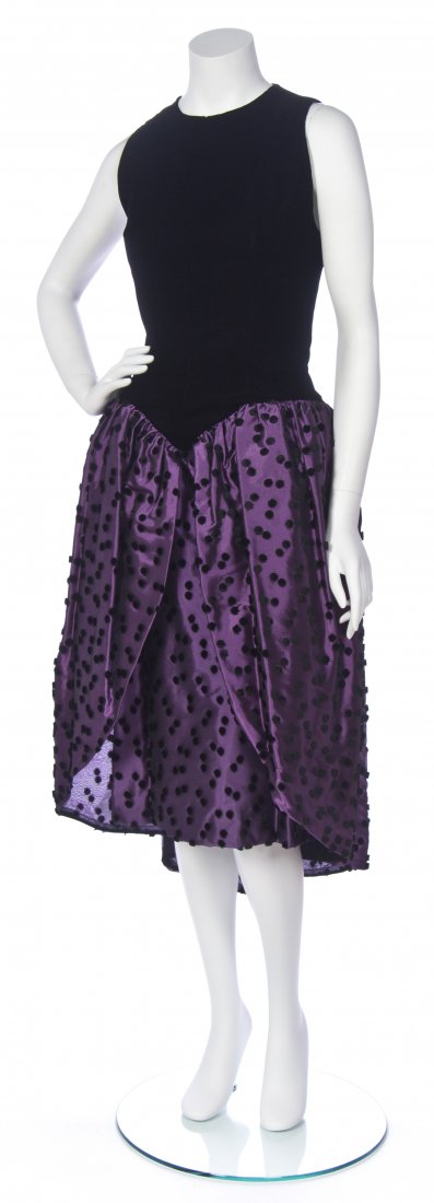 A Murray Arbeid Black Velvet Evening Dress,: A Murray Arbeid Black Velvet Evening Dress, sleeveless with purple and black velvet polka dot high-low skirt. Labeled: Murray Arbeid / Marshall Field. Property of a Lady, Chicago, Illinois