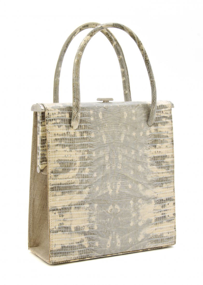 A Stuart Weitzman Cream and Gray Lizardskin Bag, 8 x 8 : A Stuart Weitzman Cream and Gray Lizardskin Bag, two top handles, natural linen gussets, silvertone closure, logo fabric lining. Stamped: Stuart Weitzman. 8 x 8 x 3 inches.