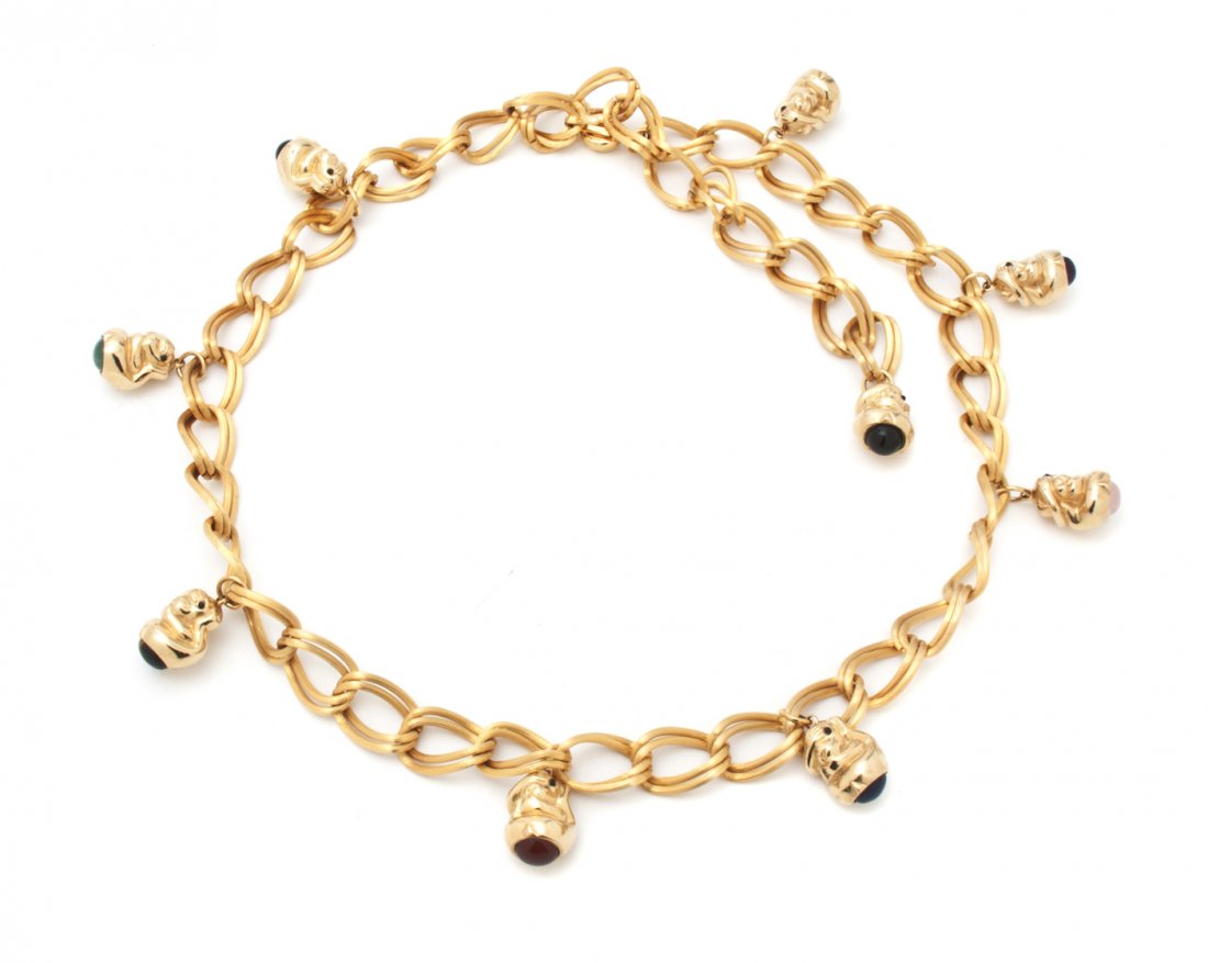 A Judith Leiber Goldtone Chainlink Belt,: A Judith Leiber Goldtone Chainlink Belt, with 'See No Evil' monkey pendants. Stamped: Judith Leiber.