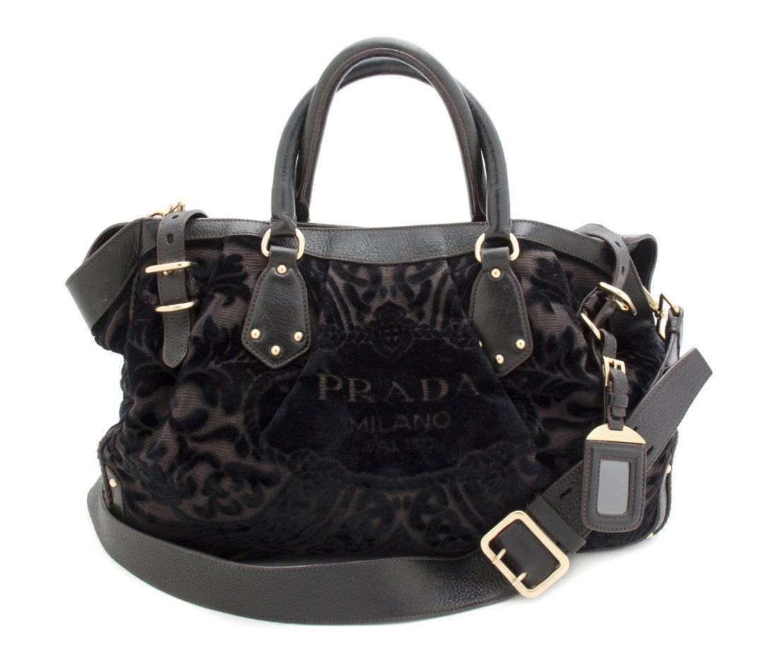 A Prada Black Burnt Out Velvet Bag, 16 x 10 x 5 inches.: A Prada Black Burnt Out Velvet Bag, goldtone hardware, black leather trim, detachable shoulder strap, black jacquard lining. Stamped: Prada. 16 x 10 x 5 inches. Property of a Lady, Chicago, Illinois