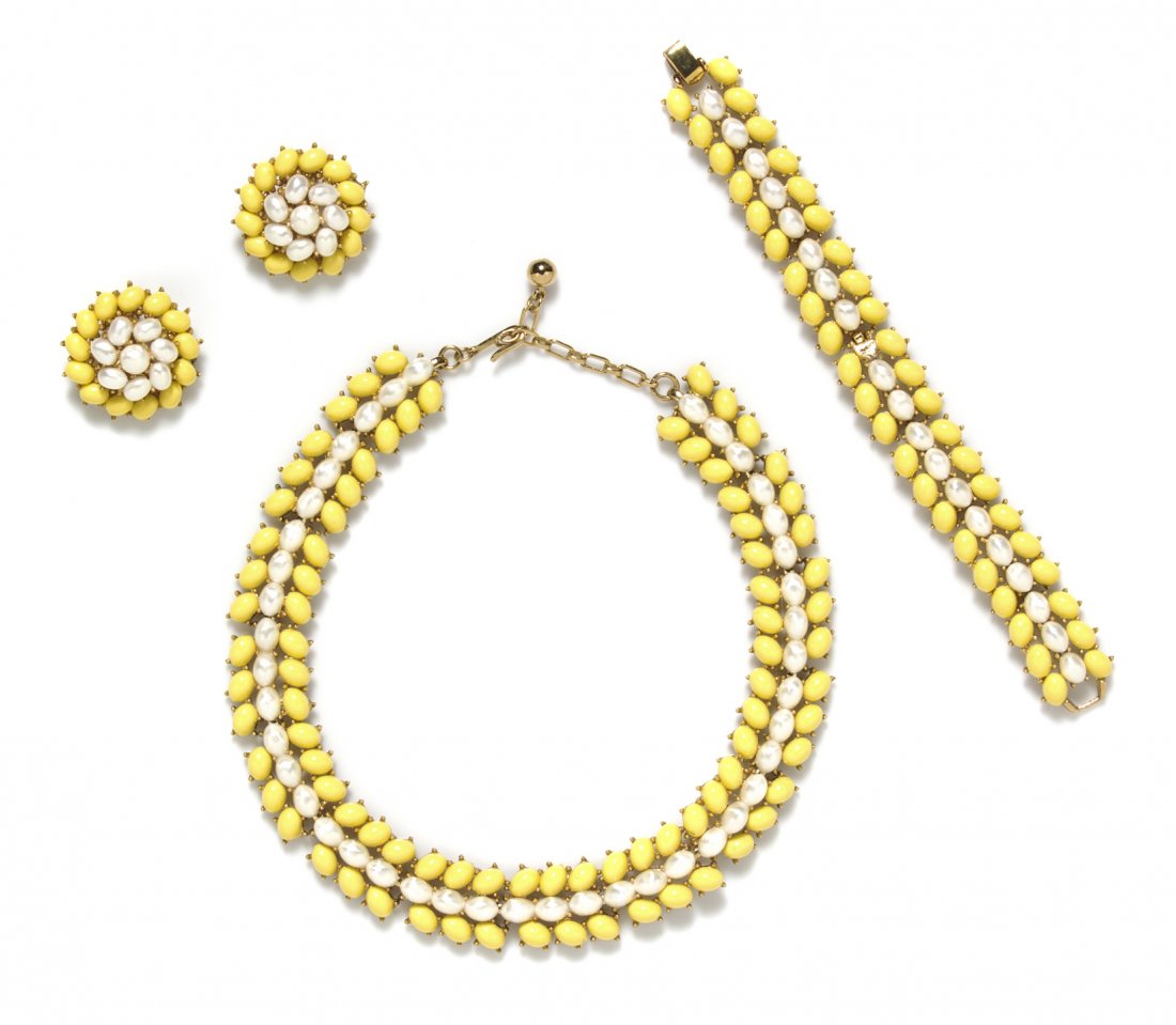 A Trifari Yellow and White Suite,: A Trifari Yellow and White Suite, comprised of a necklace, bracelet and a pair of earclips. All stamped: Trifari. Property from an Important Collector, Chicago, Illinois