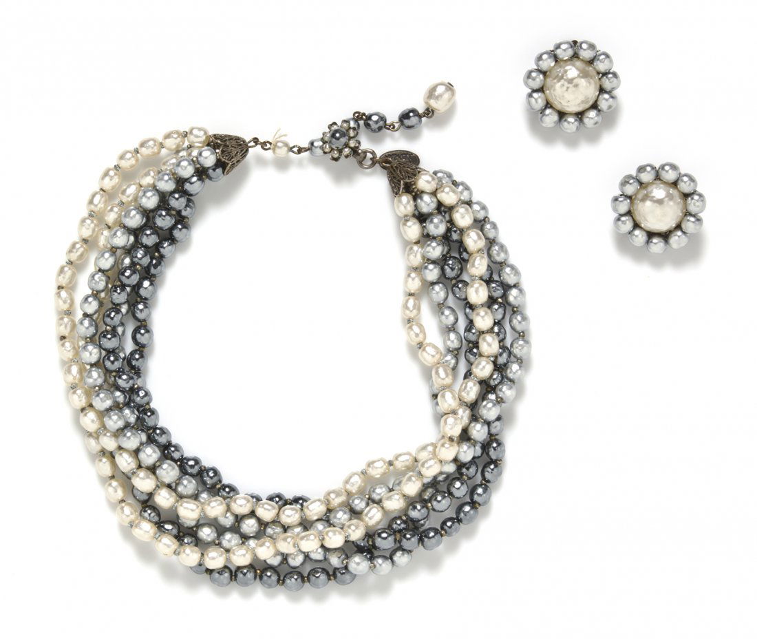 A Miriam Haskell Multicolor Faux Baroque Pearl Suite,: A Miriam Haskell Multicolor Faux Baroque Pearl Suite, comprised of earclips and a necklace, with white, silver and gunmetal pearls. All stamped: Miriam Haskell.