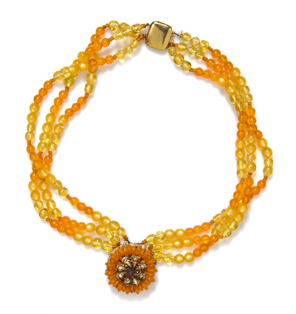 A Miriam Haskell Triple Strand Multicolor Pendant Neckl: A Miriam Haskell Triple Strand Multicolor Pendant Necklace, circular pendant with orange beads and yellow and amber rhinestones suspended from a strand of orange and yellow beads. Stamped: Miriam Hask