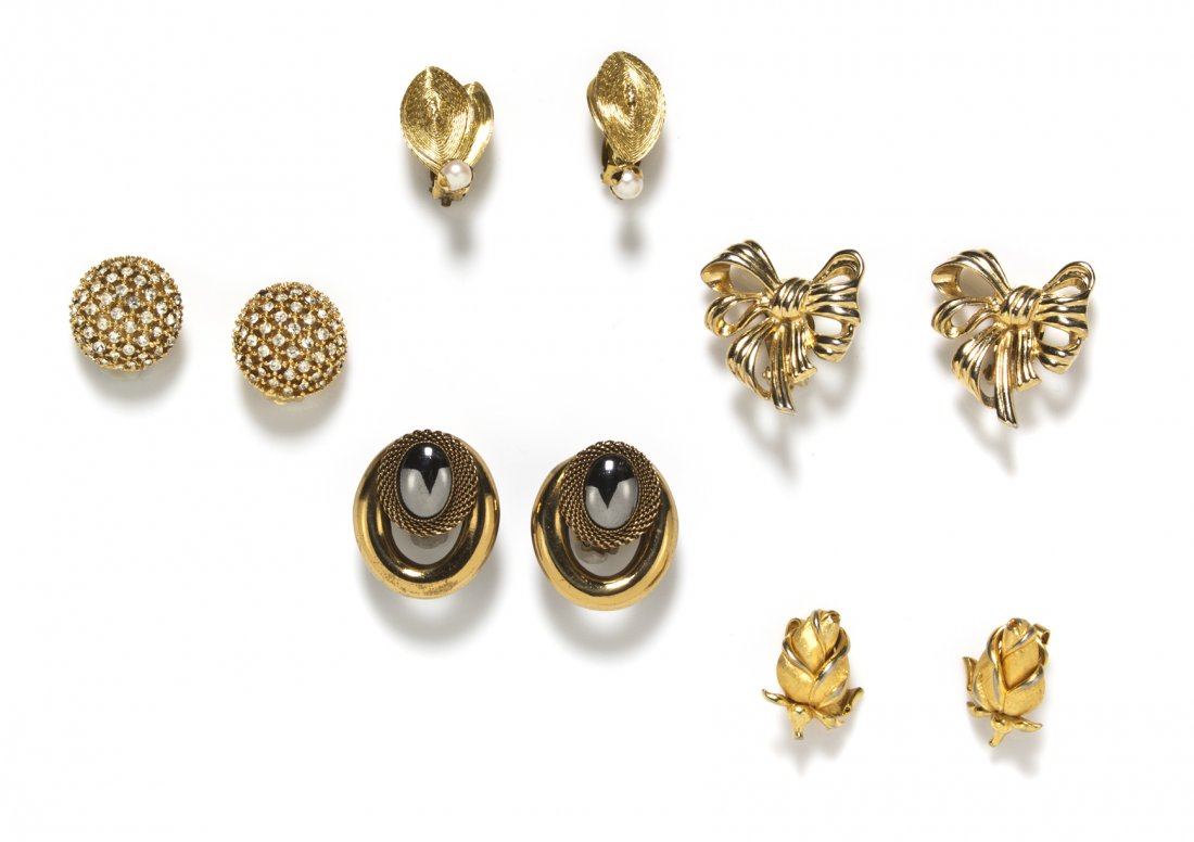A Group of Five Pairs of Goldtone Earclips,: A Group of Five Pairs of Goldtone Earclips, comprised of a pair of Ciner rhinestone dome earclips stamped Ciner, a pair of Givenchy bow earclips stamped Givenchy, a pair of Trifari rosebud earclips st