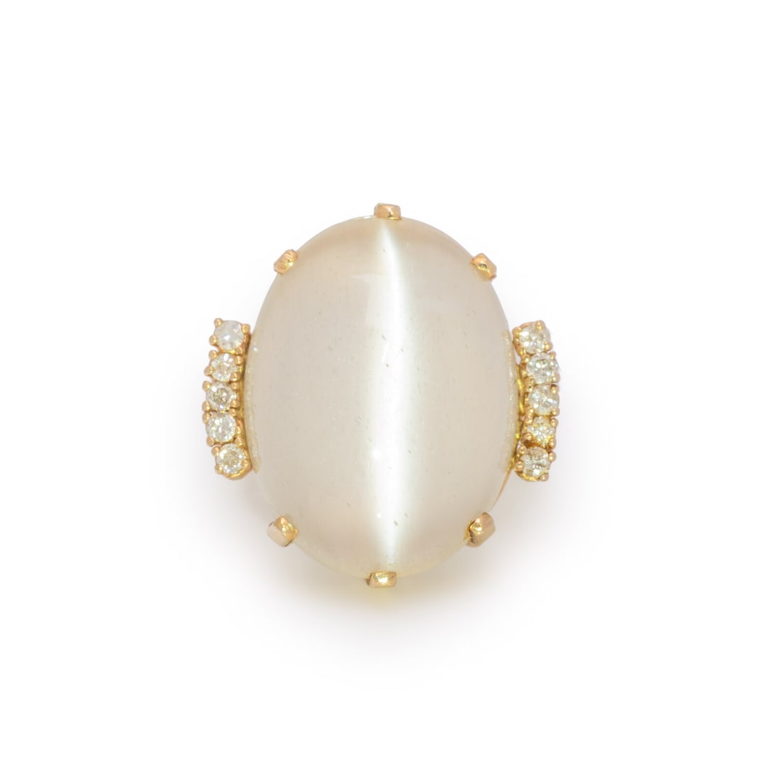 CAT’S EYE MOONSTONE RING: CAT’S EYE MOONSTONE RING Oval cabochon cat's eye moonstone measuring approximately 22.30 x 16.95 x 8.30 mm and round and single cut diamonds. Yellow gold. Ring size 5 1/4. Gross weight: 6.70 dwt
