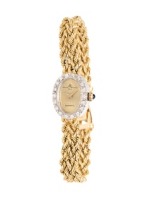 BAUME & MERCIER, YELLOW GOLD AND DIAMOND WATCH