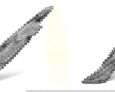 A French Carved Limestone Sculpture of a Female Saint Possibly Depicting Saint Catherine of: A French Carved Limestone Sculpture of a Female Saint Possibly Depicting Saint Catherine of Alexandria Late 15th Century the back with iron hook. Height 27 x width 9 x depth 5 inches. This lot is