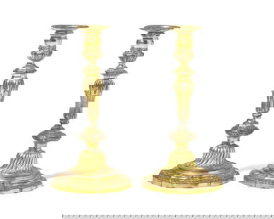 A Pair of Louis XVI Ormolu Candlesticks: A Pair of Louis XVI Ormolu Candlesticks Second Half 18th Century with detachable bobeches. Height 10 3/4 x diameter 5 1/2 inches (overall). This lot is located in Philadelphia. Provenance: Junius