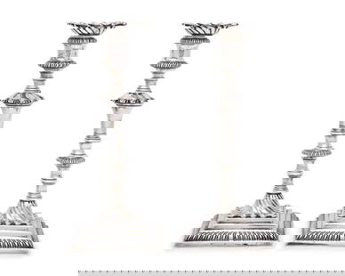 A Pair of George III Sterling Silver Candlesticks Bearing an Armorial Crest for the Morgan Family: A Pair of George III Sterling Silver Candlesticks Bearing an Armorial Crest for the Morgan Family William Cafe, London, 1762 with detachable bobeches, the candle cups engraved with crest for the