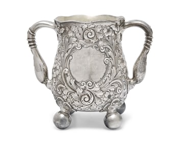 An Aesthetic Movement Sterling Silver Floral Repousse Loving Cup