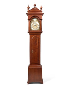 A Fine Queen Anne Carved and Figured Walnut Eight-Day Tall Case Clock