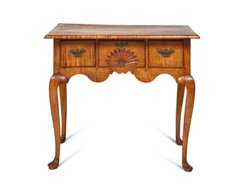 A Fine Queen Anne Fan-Carved Tiger Maple Dressing Table
