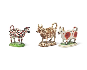 A Group of Three Staffordshire Cow-Form Creamers