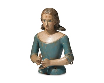 A Carved and Painted Mannequin of a Young Woman