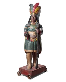 A Carved and Polychrome Painted Tobacconist Figure