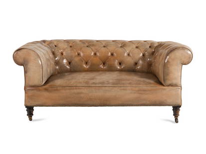 A Leather Upholstered Chesterfield Sofa: A Leather Upholstered Chesterfield Sofa 20th Century Height 27 x width 64 x depth 33 inches. Property from a Private Illinois Collector This lot is located in Chicago.