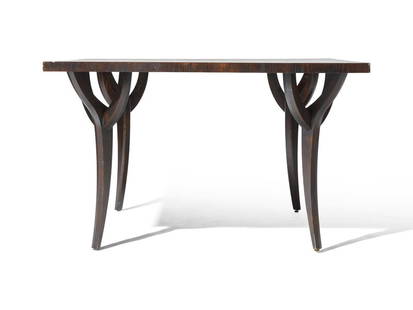 An Ebonized and Veneered Ash Dining Table : An Ebonized and Veneered Ash Dining Table Designed by Juan MontoyaHeight 29 x width 48 x depth 48 inches. This lot is located in Philadelphia. SizeHeight 29 x width 48 x depth 48