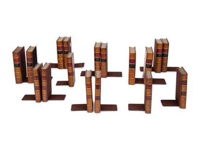 A Collection of Book-Form Bookends: A Collection of Book-Form Bookends 20th Century comprising 17 examples. Largest height 7 1/2 inches. Property from a Private Illinois Collector This lot is located in Chicago. 