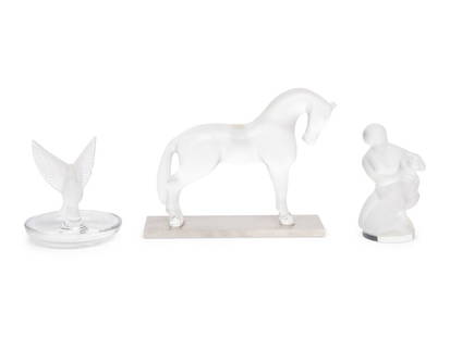 Three Lalique Articles: Three Lalique Articles Largest 6 x 7 inches. Property from the Collection of Eileen and Richard Schilling, Rockford, Illinois This lot is located in Chicago. ConditionThe horse broken from its