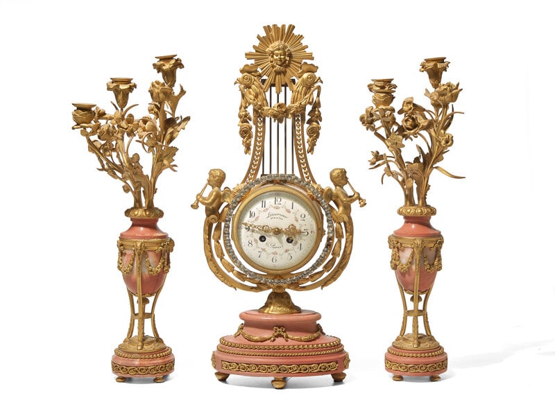 A Louis XVI Style Gilt Bronze and Pink Marble Three-Piece Clock Garniture (1 of 2)