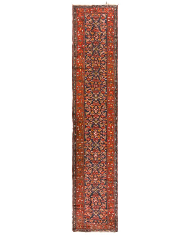 A Hamadan Wool Runner: A Hamadan Wool Runner Circa 1930-40 16 feet 1 inch x 3 feet 5 inches. Property from the Collection of Catharine and David Hamilton, Chicago, Illinois This lot is located